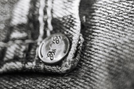 A black and white pocket on a pair of jeansの写真素材