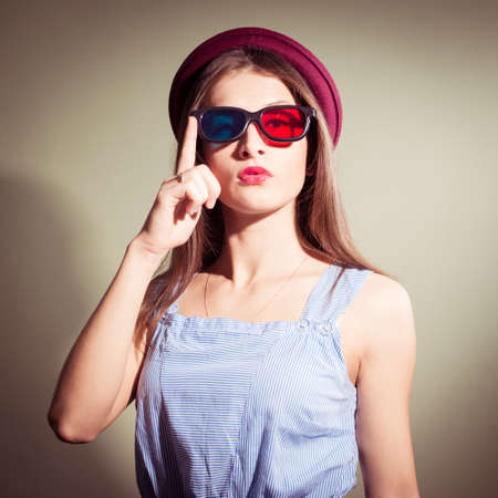 Girl in 3d glasses thoughtfully looking