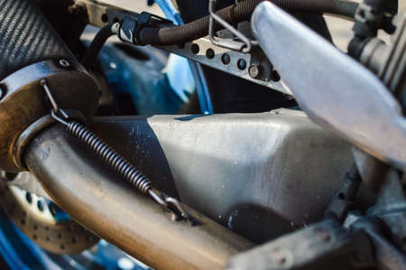 Closeup on motorbike metal engine parts details