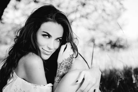 Black and white photography of spring summer woman outdoors backgroundの写真素材