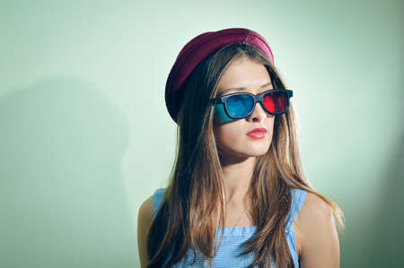 Surprised young pretty woman in 3d glasses looking amazed. Beautiful elegant romantic female...