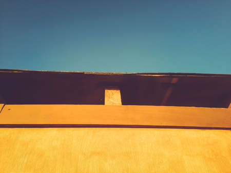 Natural wooden surface and blue sky outdoors backgroundの写真素材