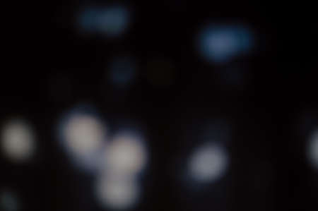 Blurry bokeh light festive time backgroundの写真素材