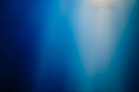 Light blue abstract blurry bokeh background