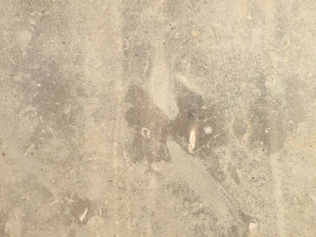 Closeup on beige marble texture surface backgroundの写真素材