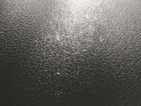 Blurred drops of rain on copyspace surface background, closeup pictureの写真素材