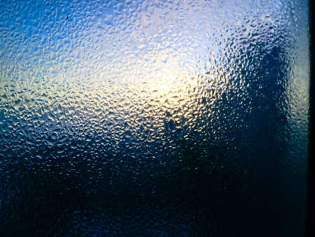 Moisture wet window glass abstract backgroundの写真素材