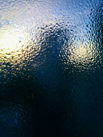 Close up view on condensation window blurry texture background. Blurred macro photoの写真素材