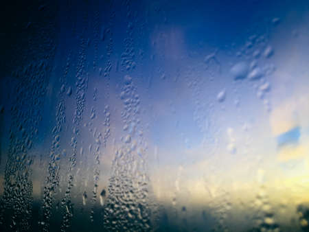 Close up view on condensation window blurry texture background. Blurred macro photoの写真素材