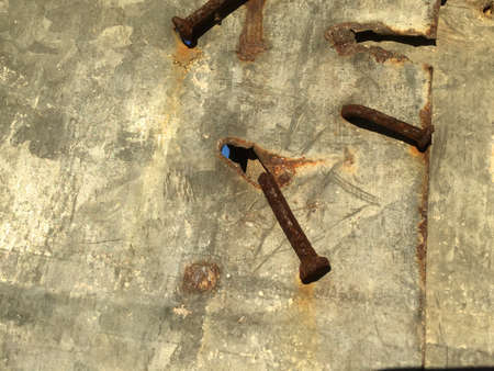 Vintage grungy background of galvanized rusty metal wall texture surfaceの写真素材