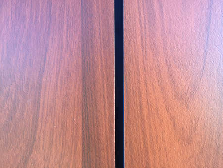 Laminated wooden surface background, closeup pictureの写真素材