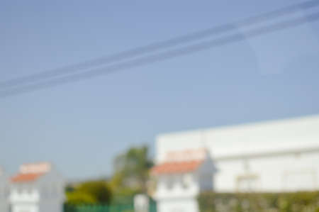 Blurry defocused building abstract outdoor sunlight background.の写真素材