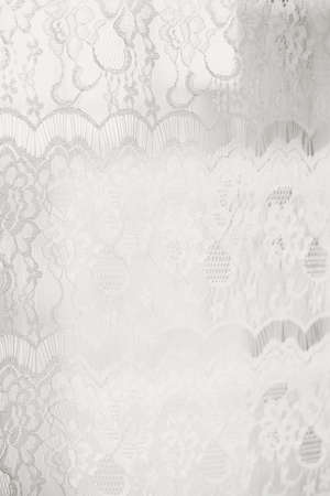 Light window behind transparent curtain sunny abstract backgroundの写真素材