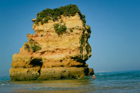 Atlantic ocean view of Algarve coastline. Beautiful seascape sunny beach in Lagos Portugal. Dream vacation picturesque destination. Serenity location for relaxation and contemplation.の写真素材