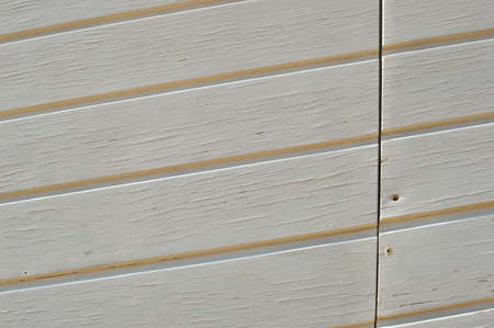 Close up of light grey white wooden panels abstract backgroundの写真素材