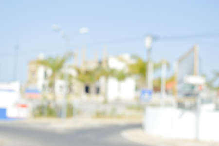 Blurred defocused image of commercial building, shopping street on sunny outdoors backgroundの写真素材