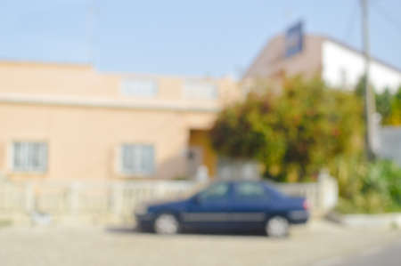 Blurred defocused image of commercial building, shopping street on sunny outdoors backgroundの写真素材