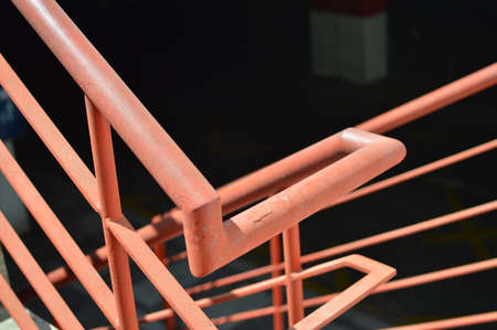 Abstract emergency stairs access for people, gray textured color empty stairway indoors grungy structure backgroundの写真素材