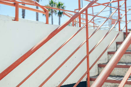 Abstract emergency stairs access for people, gray textured color empty stairway indoors grungy...