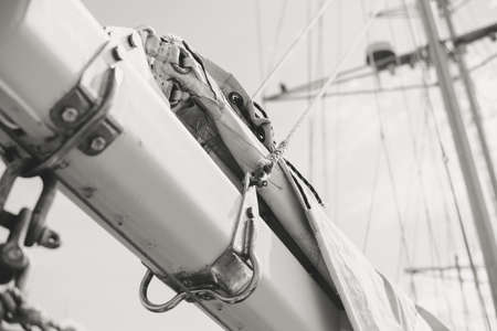 Yachting sail mast detail on sunny sky background. Romantic adventure book cover idea designの写真素材
