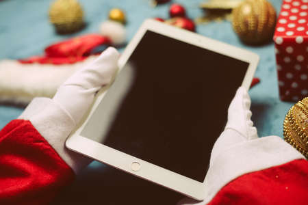 Oslo, Norway - 05 December 2016: Top view closeup on Apple Ipad 2 tablet ready for busy Christmas...