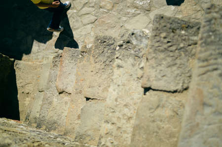 Macro closeup detail of stone surface for abstract grunge stonewall natural textured backgroundの写真素材