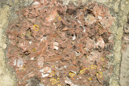 Macro closeup detail of stone surface for abstract grunge stonewall natural textured background