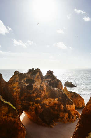 Landscape of the rocks, cliffs and ocean beach coastline Algarve Portugal, Europe. Sunny day, 2018. Panoramic nature beauty seascape, sunshine viewの写真素材