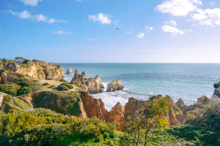 Landscape of the rocks, cliffs and ocean beach coastline Algarve Portugal, Europe. Sunny day, 2018. Panoramic nature beauty seascape, sunshine viewの写真素材