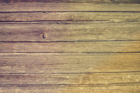 Closeup on old wood with natural textured grungy striped patterns weathered rough detail photoの写真素材