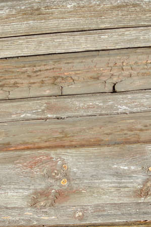 Closeup on old wood with natural textured grungy striped patterns weathered rough detail photoの写真素材