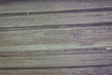 Closeup on old wood with natural textured grungy striped patterns weathered rough detail photoの写真素材