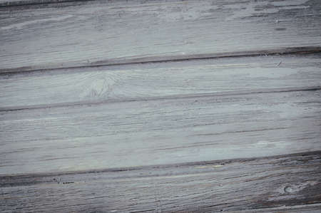 Closeup on old wood with natural textured grungy striped patterns weathered rough detail photoの写真素材