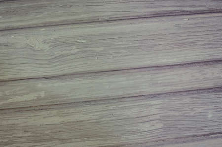 Closeup on old wood with natural textured grungy striped patterns weathered rough detail photoの写真素材