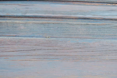 Closeup on old wood with natural textured grungy striped patterns weathered rough detail photoの写真素材