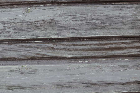 Closeup on old wood with natural textured grungy striped patterns weathered rough detail photoの写真素材