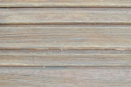 Closeup on old wood with natural textured grungy striped patterns weathered rough detail photoの写真素材