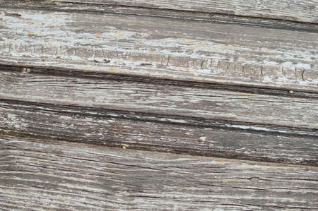 Closeup on old wood with natural textured grungy striped patterns weathered rough detail photoの写真素材