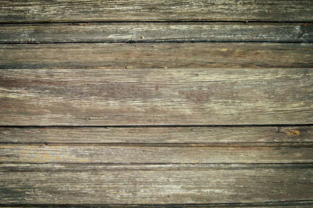 Closeup on old wood with natural textured grungy striped patterns weathered rough detail photoの写真素材