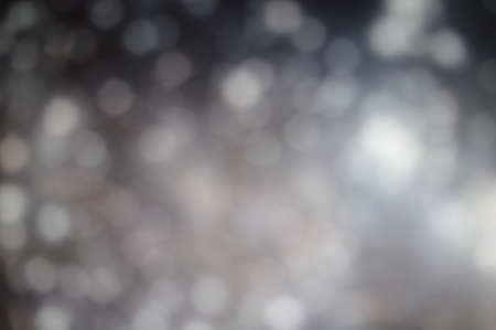 Bright lights blurred colorful background, shiny bokeh abstraction copy spaceの写真素材