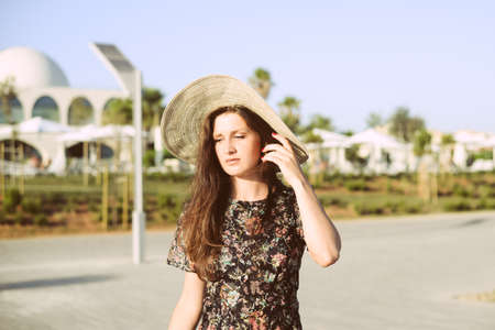 Side view of attractive woman having fun enjoying summer holiday weekend background. Harbor outdoors, amazing dreamy marine vacation freedom pleasure summertime escape conceptの写真素材