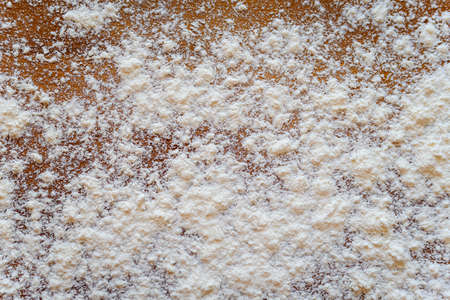 Top side view on white flour on rustic wooden table background, closeup of healthy cooking copyspace surface at home or restaurant, fabric plantの写真素材