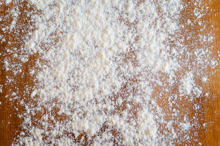 Top side view on white flour on rustic wooden table background, closeup of healthy cooking copyspace surface at home or restaurant, fabric plantの写真素材
