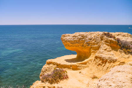 Bright blue sky and sea natural Algarve Portugal outdoors background. Sunny day travel vacation destination panoramic imagesの写真素材