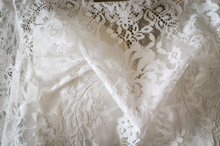 Detail of a white beautiful wedding dressの写真素材