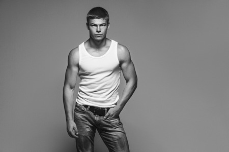 Portrait of handsome stylish man in white t-shirtの写真素材
