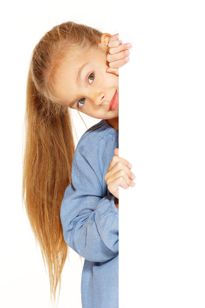 Little girl with blank sign isolated on whiteの写真素材