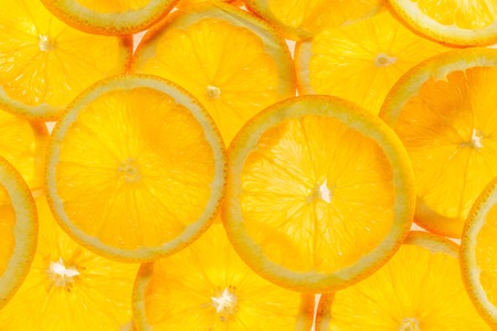 Slice of a fresh juicy orange round orangeの写真素材