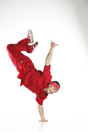 Young men dancer doing jumps and difficult elementsの写真素材