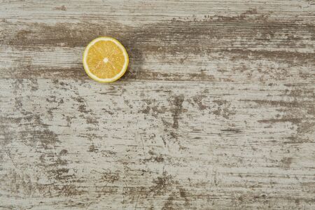 Background with copy space on wooden table with lemonsの写真素材